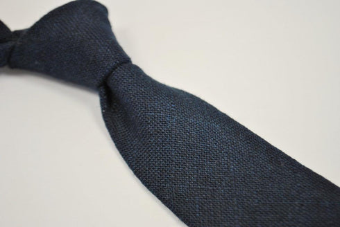 plain dark blue textured tie in 100% cotton